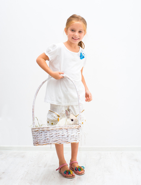 Little girl with a rabbit - Fotó, kép