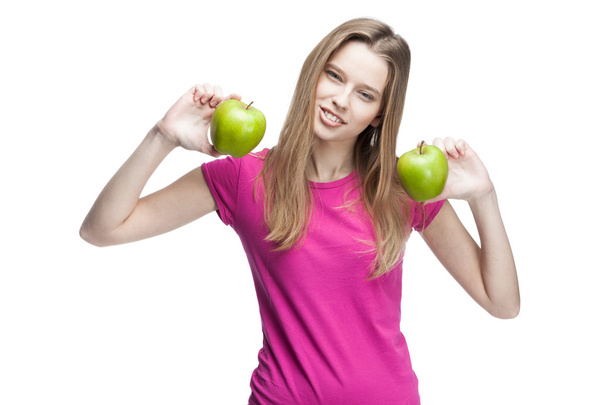 Young woman holding two green apples - Foto, Imagem