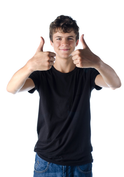 smiling teen boy doing ok thumbs up sign - Foto, Bild