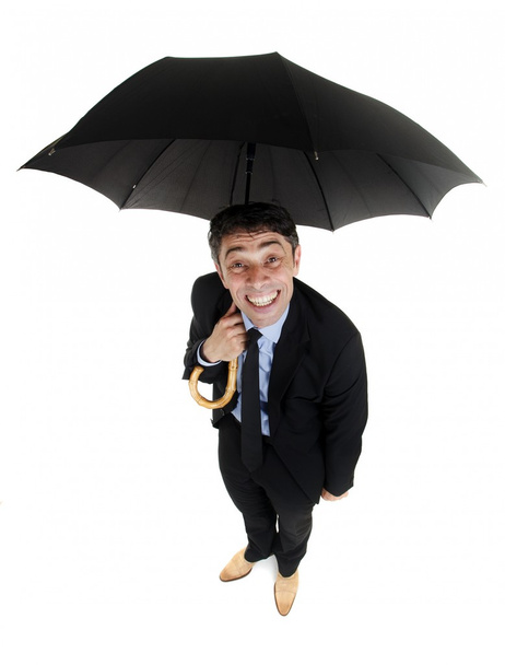 Покорный бизнесмен с зонтиком в руках
 - Фото, изображение