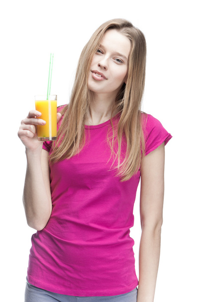 Young beautiful blond woman drinking orange juice - Foto, Imagem