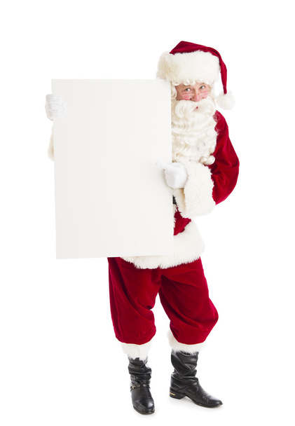 Santa Claus Pointing At Blank Billboard - Valokuva, kuva