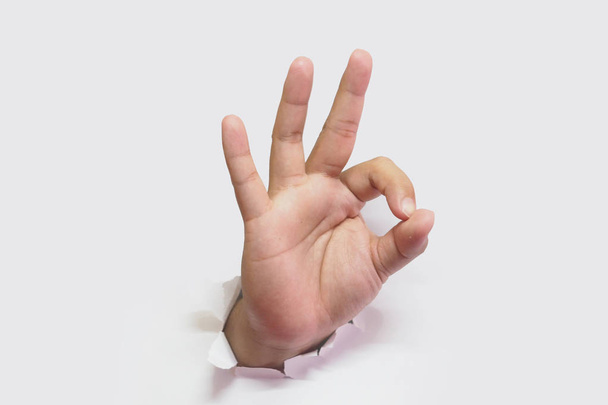 Okay Sign hand - Showing a gesture Okay, ok.  - Photo, image