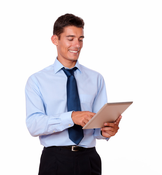 Hispanic young man in tie using tablet pc - Foto, afbeelding