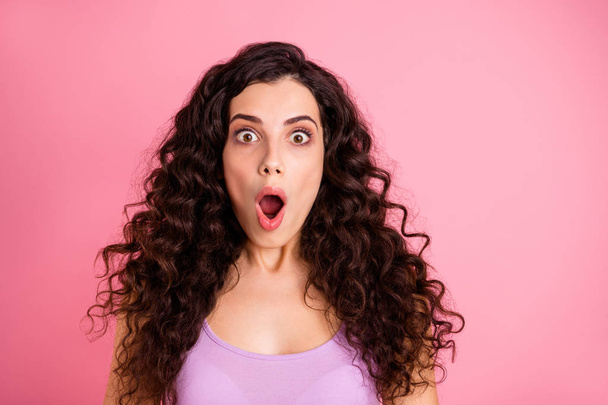 Close up photo of terrified shocked stunned girlfriend seeing something terrible with her eyes open wide while isolated with pink background - Foto, imagen