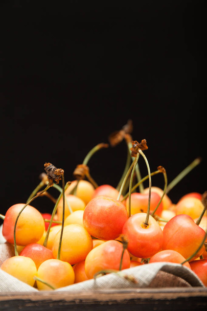 Colorful rainier cherry, sweet delicious fruit. Copy space for text. - Foto, Imagen