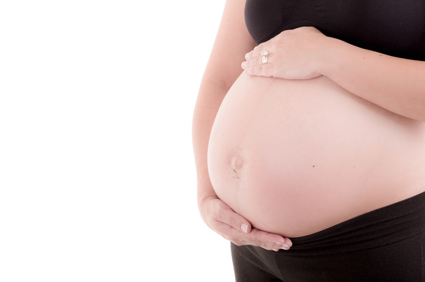Ventre d'une femme enceinte hispanique
 - Photo, image