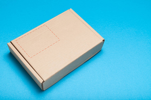 Delivery box parcel, craft cardboard. - Fotoğraf, Görsel