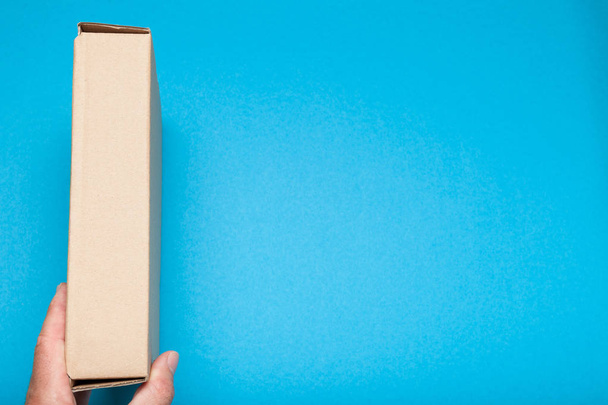Open cardboard box, free delivery package, top view. Copy space for text. - 写真・画像