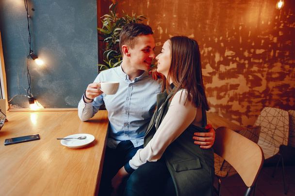 cute couple in a cafe - Foto, imagen