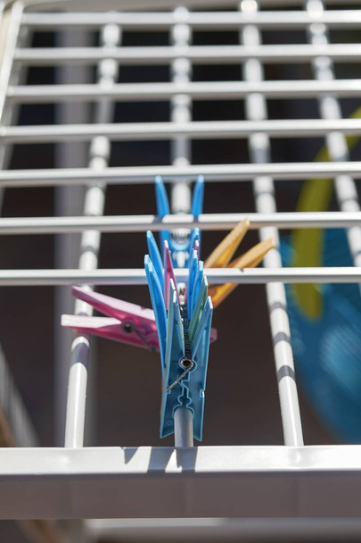 clothespins on an empty drying rack - Photo, Image