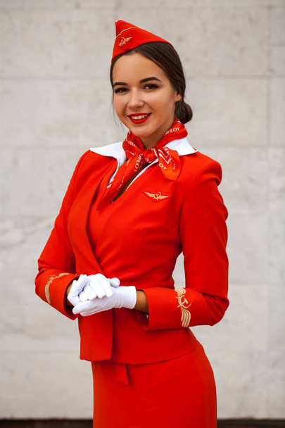 RUSSIA, SAMARA: 08 AUGUST 2019. Sexy stewardess dressed in offic - Фото, зображення