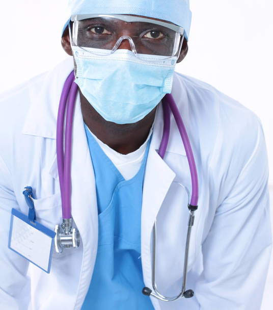 Male surgeon doctor in scrubs uniform with medical stethoscope - Foto, immagini