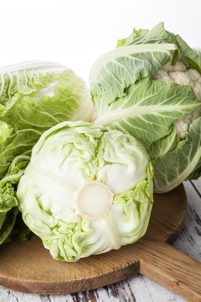 Fresh cauliflower and cabbage background. - Фото, изображение