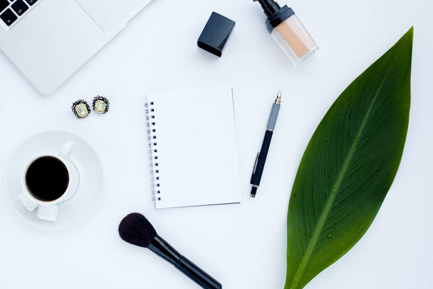 Flat lay girly, pale black items for planning, notepads, pens, office work or working at home on her laptop, on the pale white background, with place for labels. Concept Desk. - 写真・画像