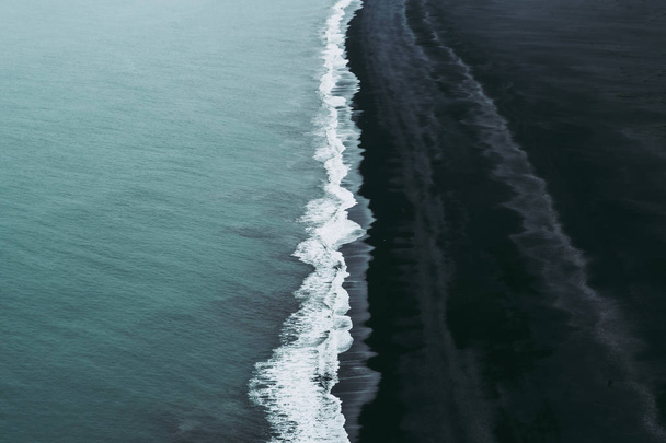 Splendid black sand beach in Vik, Iceland - Fotó, kép