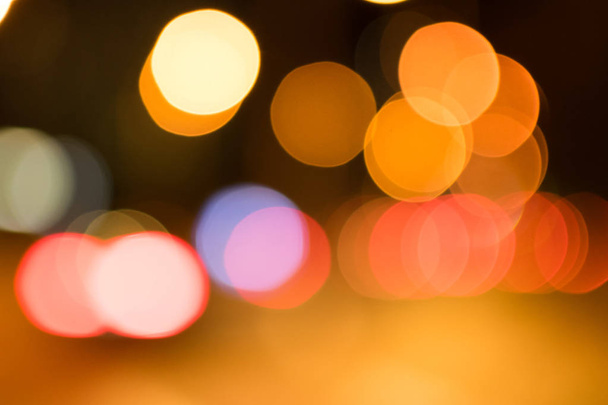 Blurred bokeh circles and colorful spots for abstract festive background. - Fotó, kép