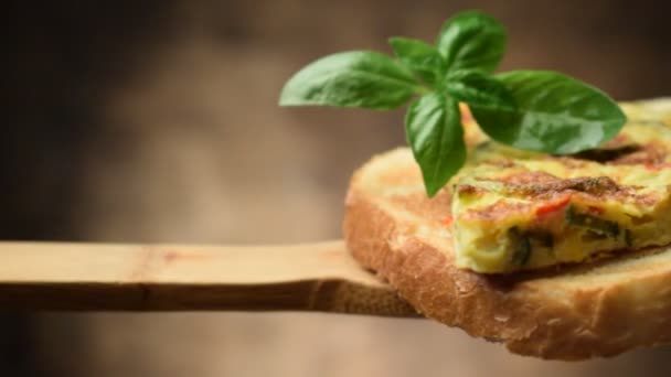 Hen egg Frittata with slice of bread - Footage, Video