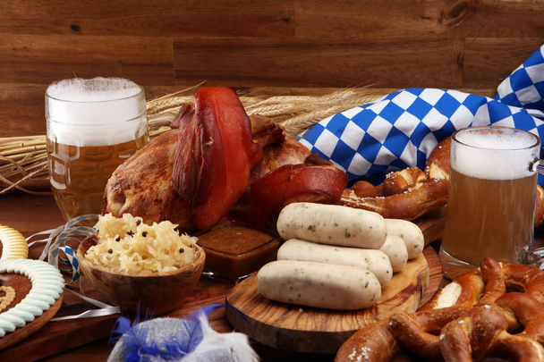 Traditional German cuisine, Schweinshaxe roasted ham hock. Beer, - Photo, Image