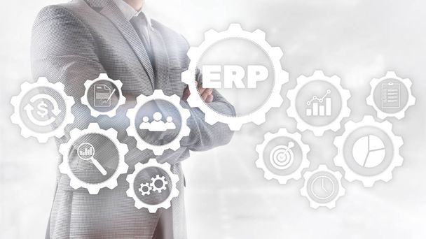 ERPシステム、背景のぼやけたエンタープライズリソース計画。ビジネスオートメーションとイノベーションのコンセプト - 写真・画像