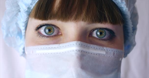 Portrait of a Close Up Woman Surgeon, Doctor With Mask Ready for Operation in Hospital or Clinic. Doctors eyes - Кадри, відео