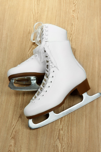 Figure skates on table close-up - Фото, изображение