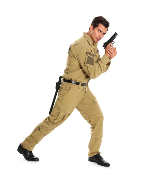 Male security guard in uniform with gun on white background - Photo, image
