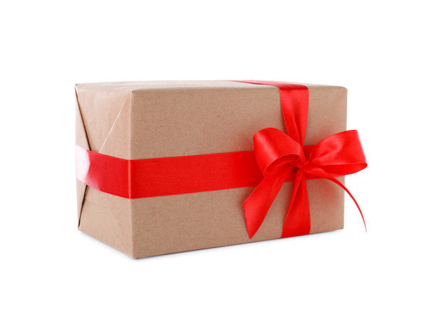 Christmas gift box decorated with ribbon bow on white background - Foto, Bild