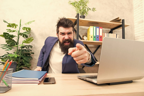 Angry boss. feeling so angry. Angry businessman. Furious mature man pointing finger on you. Blaming each other. Brutal businessman in office. Mature bearded hipster use computer. Male boss working - Photo, Image
