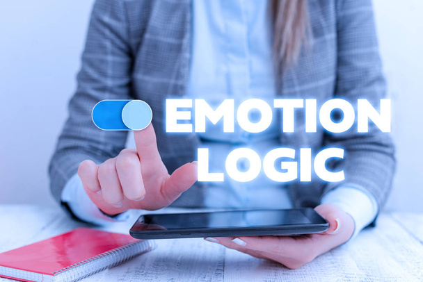 Conceptual hand writing showing Emotion Logic. Business photo showcasing Heart or Brain Soul or Intelligence Confusion Equal Balance Business concept with communication mobile phone. - Photo, Image