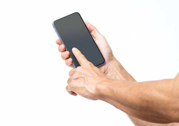 Man hand holding black smartphone isolated on white background,  - 写真・画像