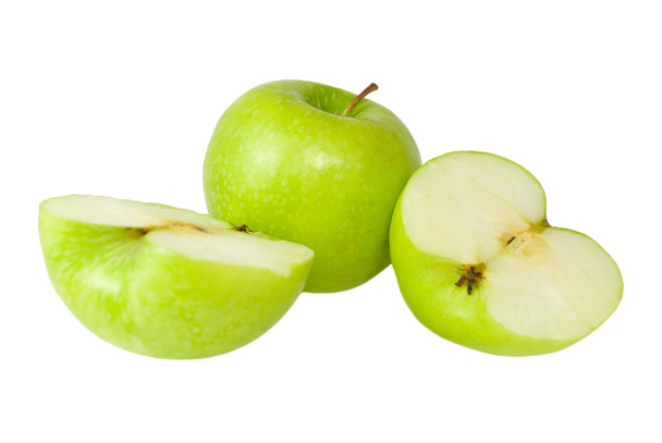 Corte na metade e maçãs verdes inteiras
 - Foto, Imagem