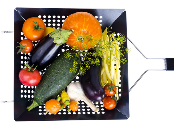 Fresh seasonal vegetables for frying in grill pan on white background - Photo, Image