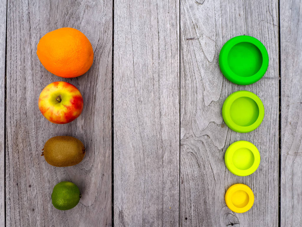Múltiples envolturas de silicona reutilizables para frutas cortadas con el fin de
 - Foto, imagen