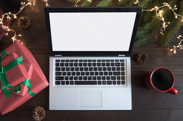 Screen laptop with space for text or special Christmas offer. Xmas shopping by laptop. Top view, flat lay. Holiday concept - Foto, Imagem