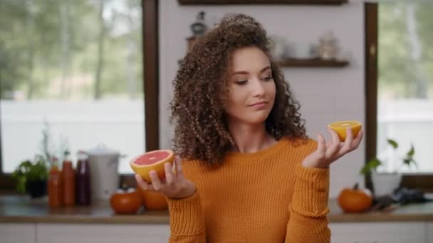 Citrus fruit used as funny eyes  - Footage, Video
