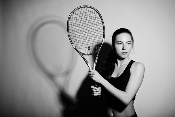 Black and white portrait of beautiful young woman player in spor - Valokuva, kuva