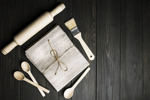 dark wooden background with cooking utensils for cooking - Foto, imagen