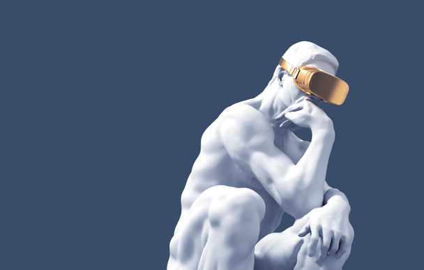 Sculptuur denker met gouden VR-bril over blauwe achtergrond - Foto, afbeelding