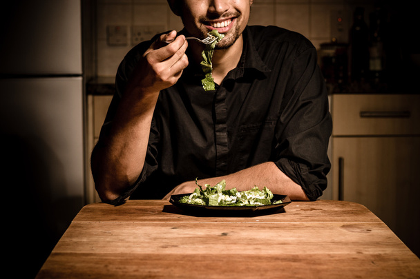 Man having dinner at home - Fotó, kép