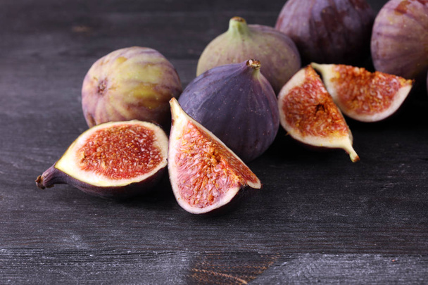 Fresh figs. Food Photo. whole and sliced figs on beautiful rusti - Photo, Image