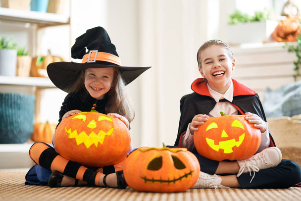 kids with carving pumpkin - Photo, image