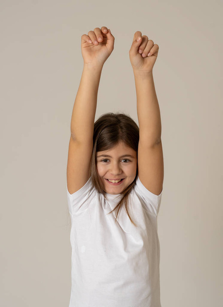 Portrait of Cute charming happy, excited, funny, cheerful young kid with a shocked, surprised face looking at the camera celebrating success or winning. Positive human emotions and children feelings. - Foto, Bild