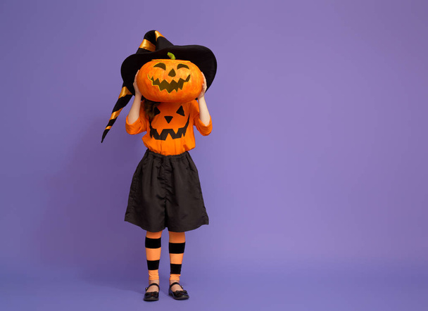 little witch on purple background - Photo, Image