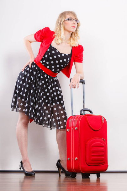 Elegant fashion woman with red suitcase - Fotoğraf, Görsel