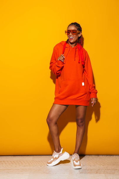 Image of adorable african american woman wearing sunglasses and  - Fotó, kép