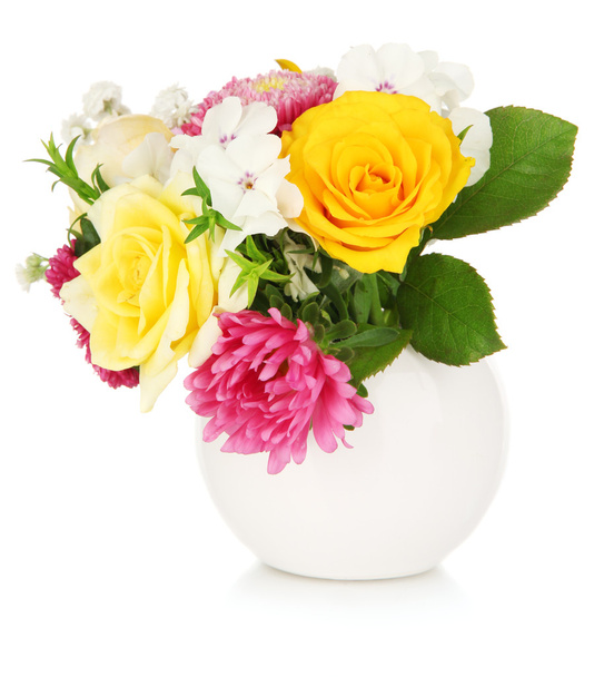 Beautiful bouquet of bright flowers in glass vase, isolated on white - Photo, image