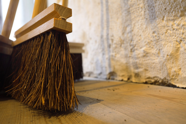 large brooms on wooden floor housework - Zdjęcie, obraz