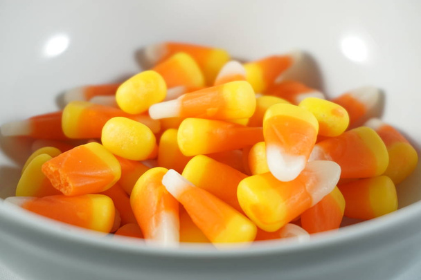 A bowl of candy corn marks the start of fall and the Halloween season. - Photo, Image