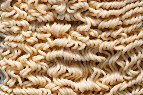 Asian instant noodles made from wheat flour. Dry and unprepared. - Photo, Image